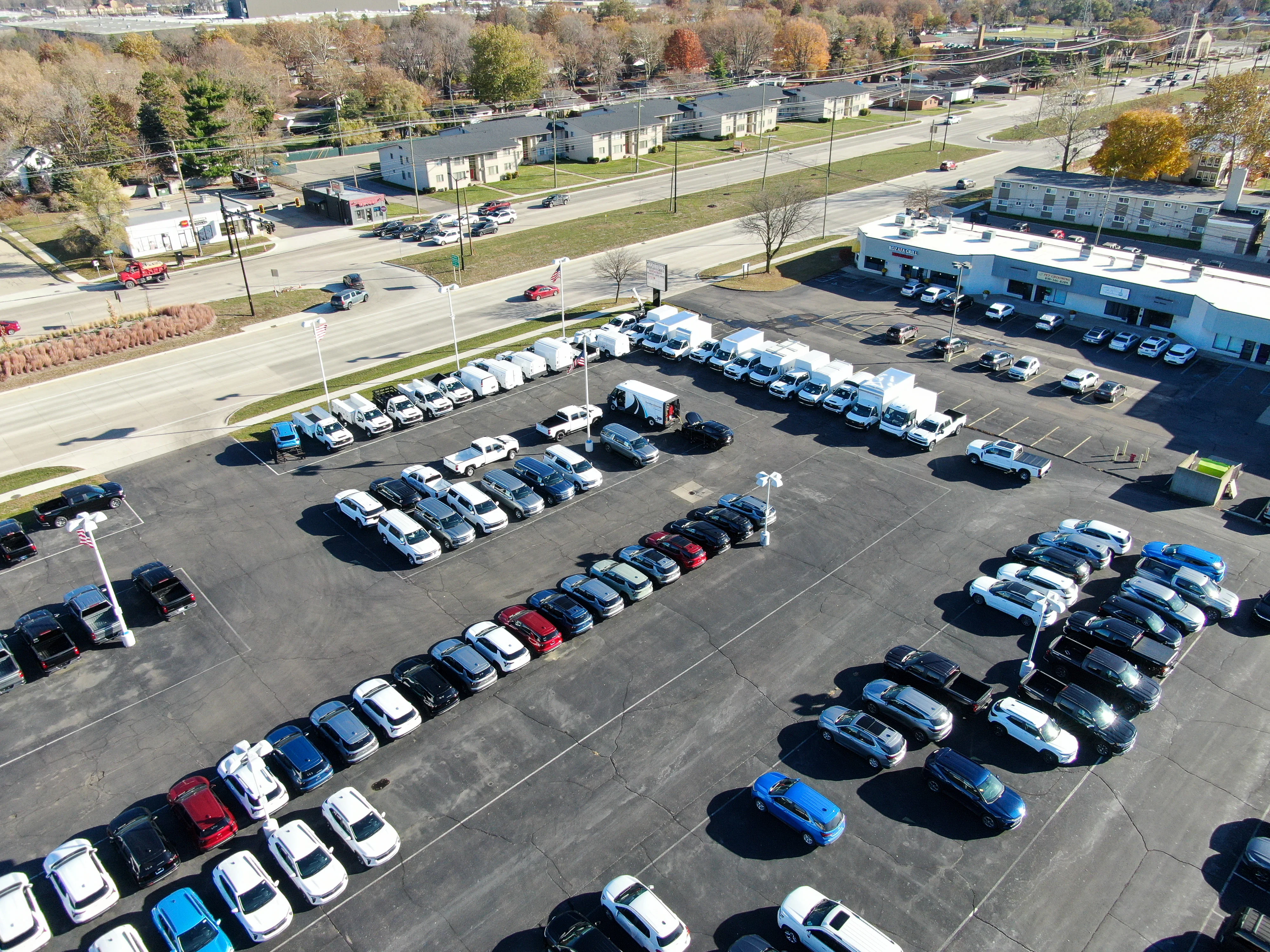 Fleet vehicles parked in a service lot